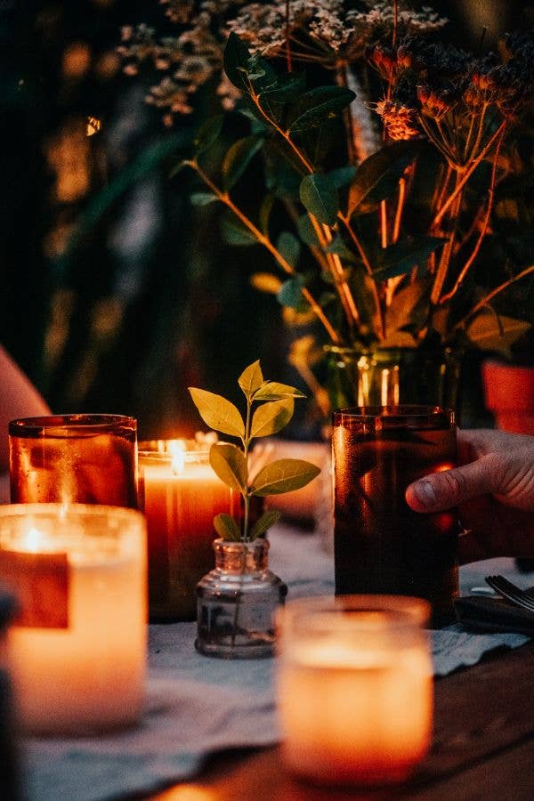 festive candlelit scene by old green