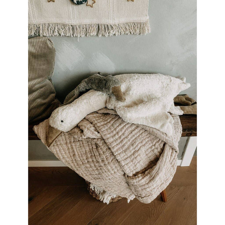 fluffy soft goose soft toy in crib