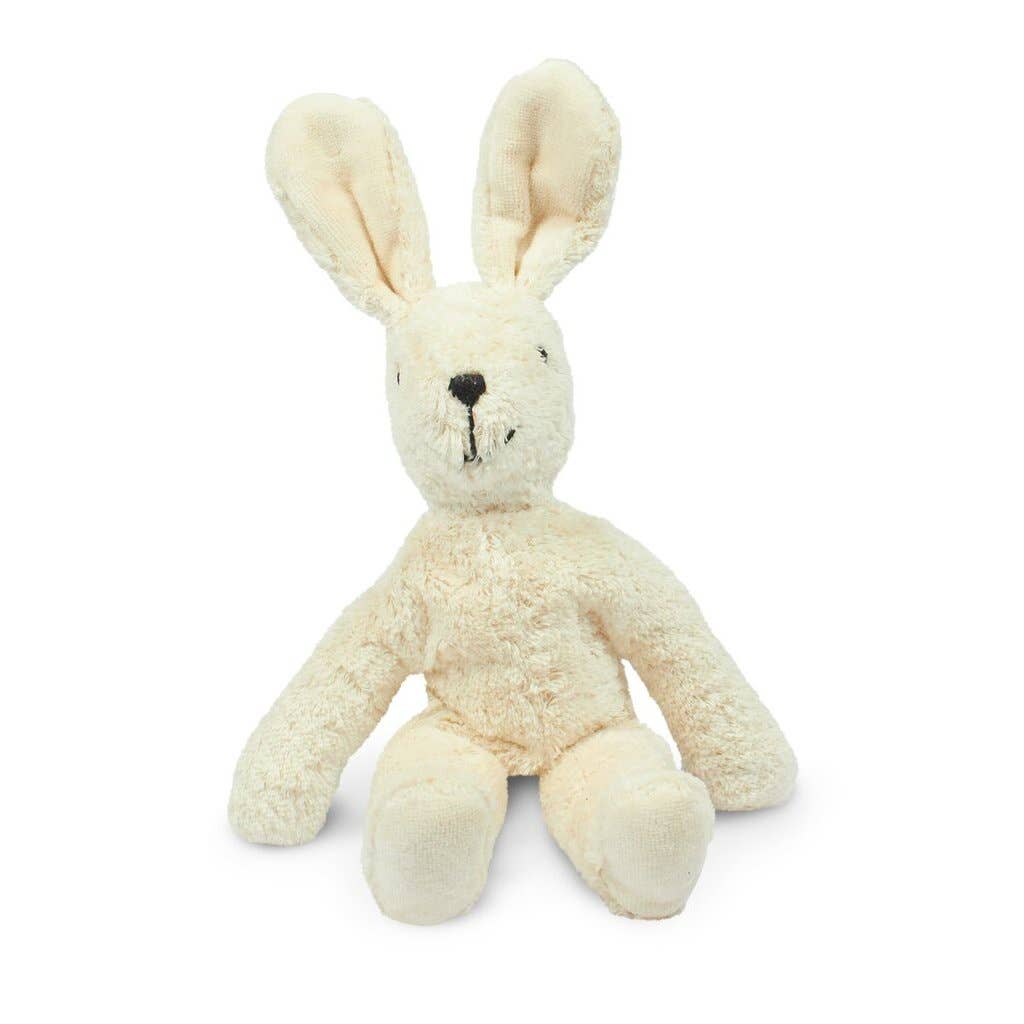 White plush bunny toy on a white background
