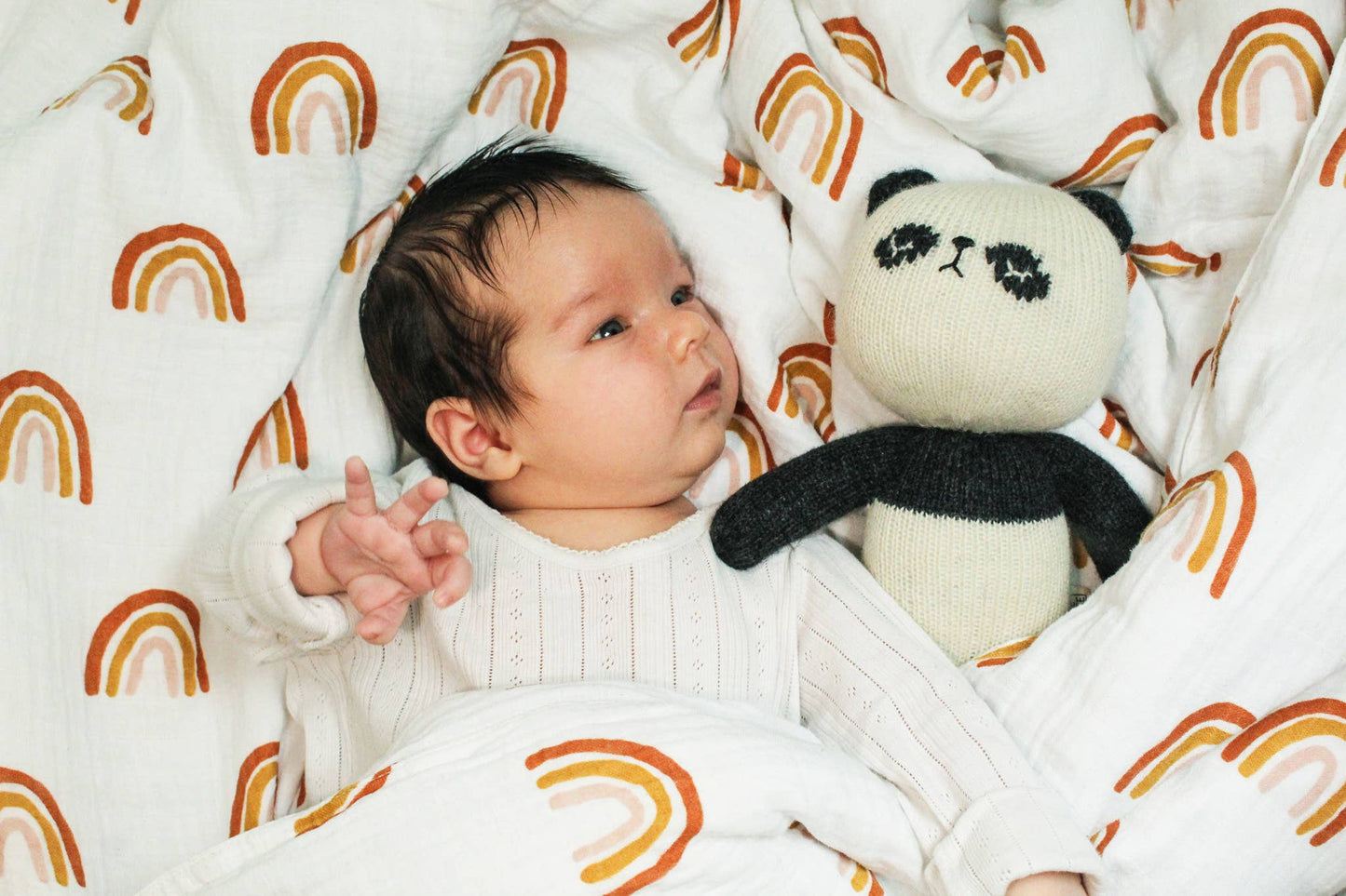 Handknitted lambswool panda toy