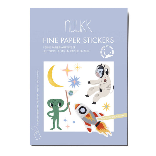 Nuukk fine paper stickers packaging with space-themed illustrations on a light blue background