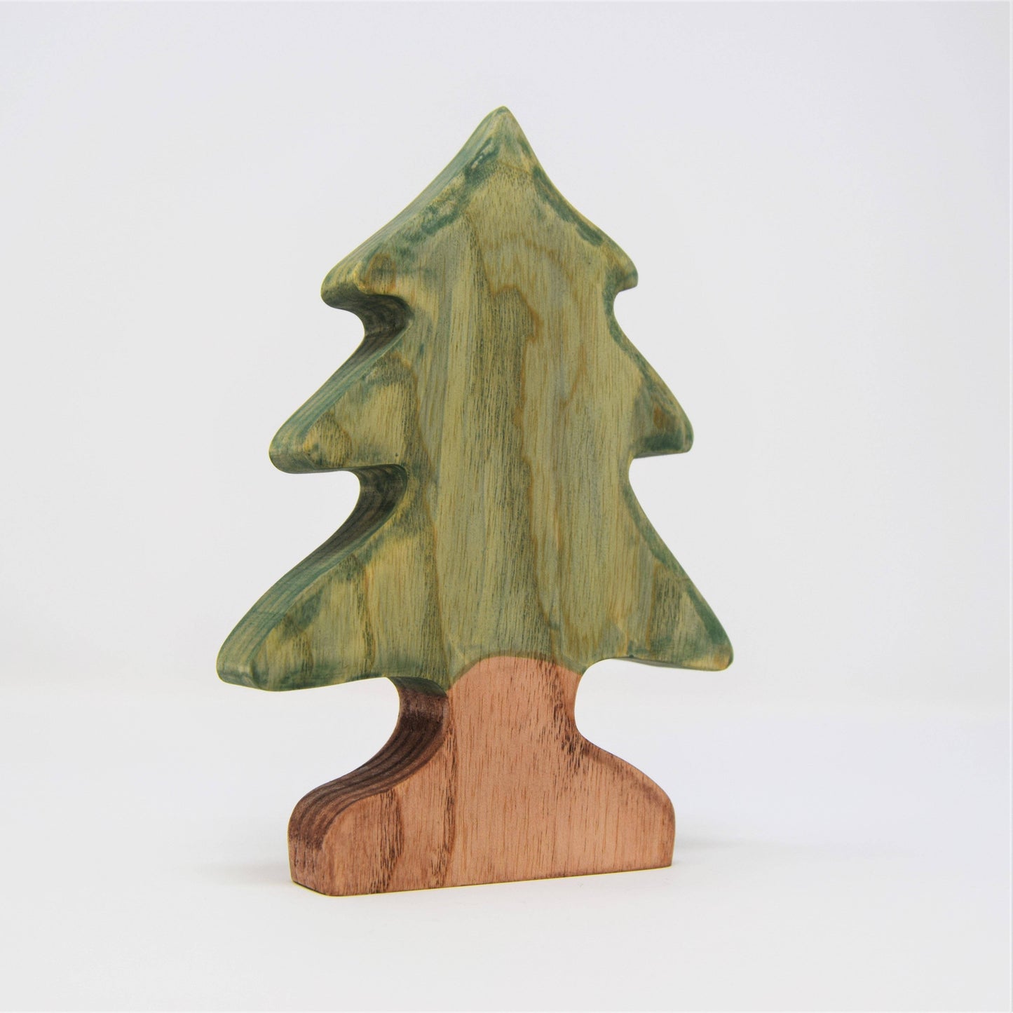 pine tree wooden toy green and brown on a white background