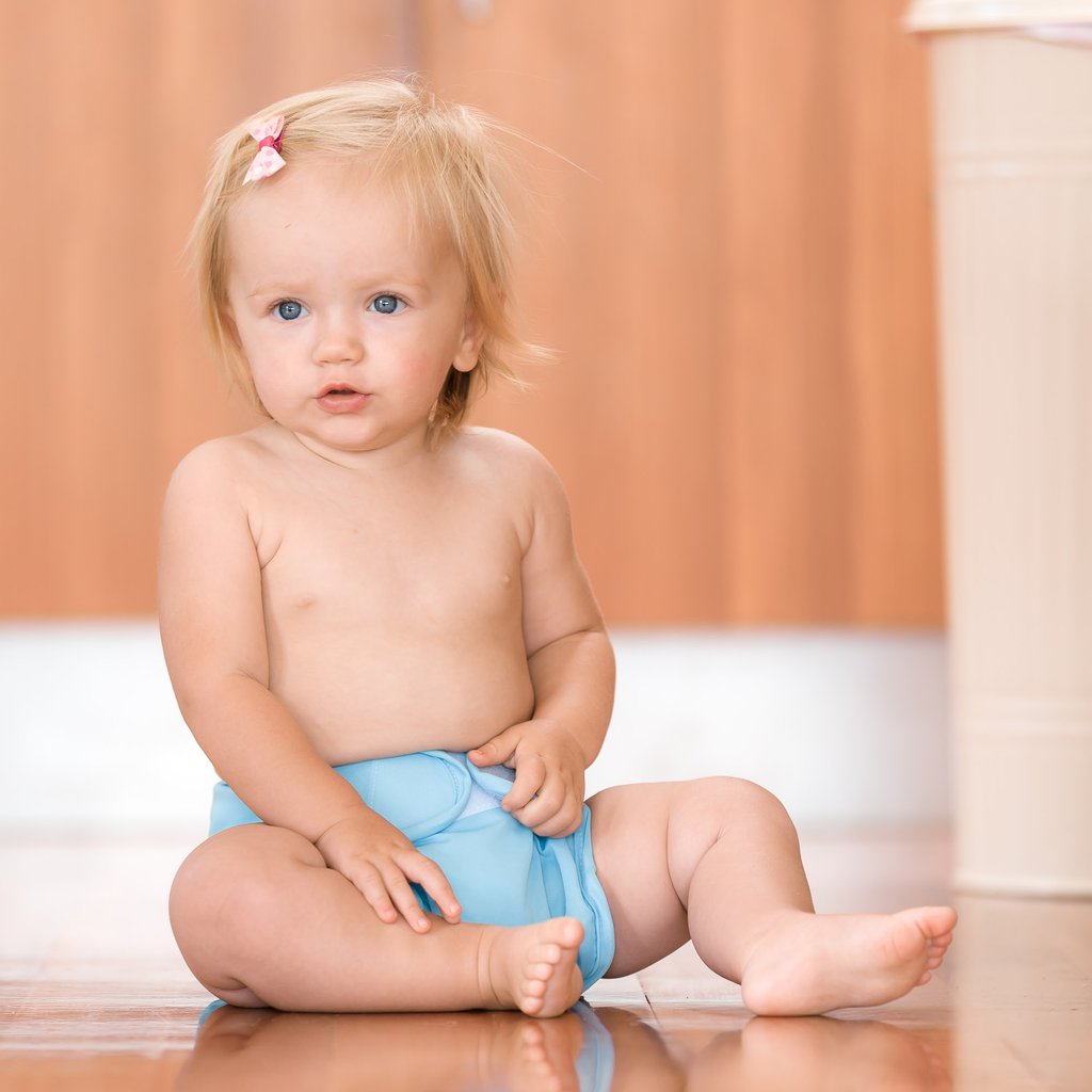 littlelamb reusable cloth nappies child wearing a reusable nappy and wrap